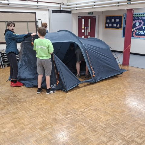 13th Howdon Scouts putting up one of their new tents in the hall